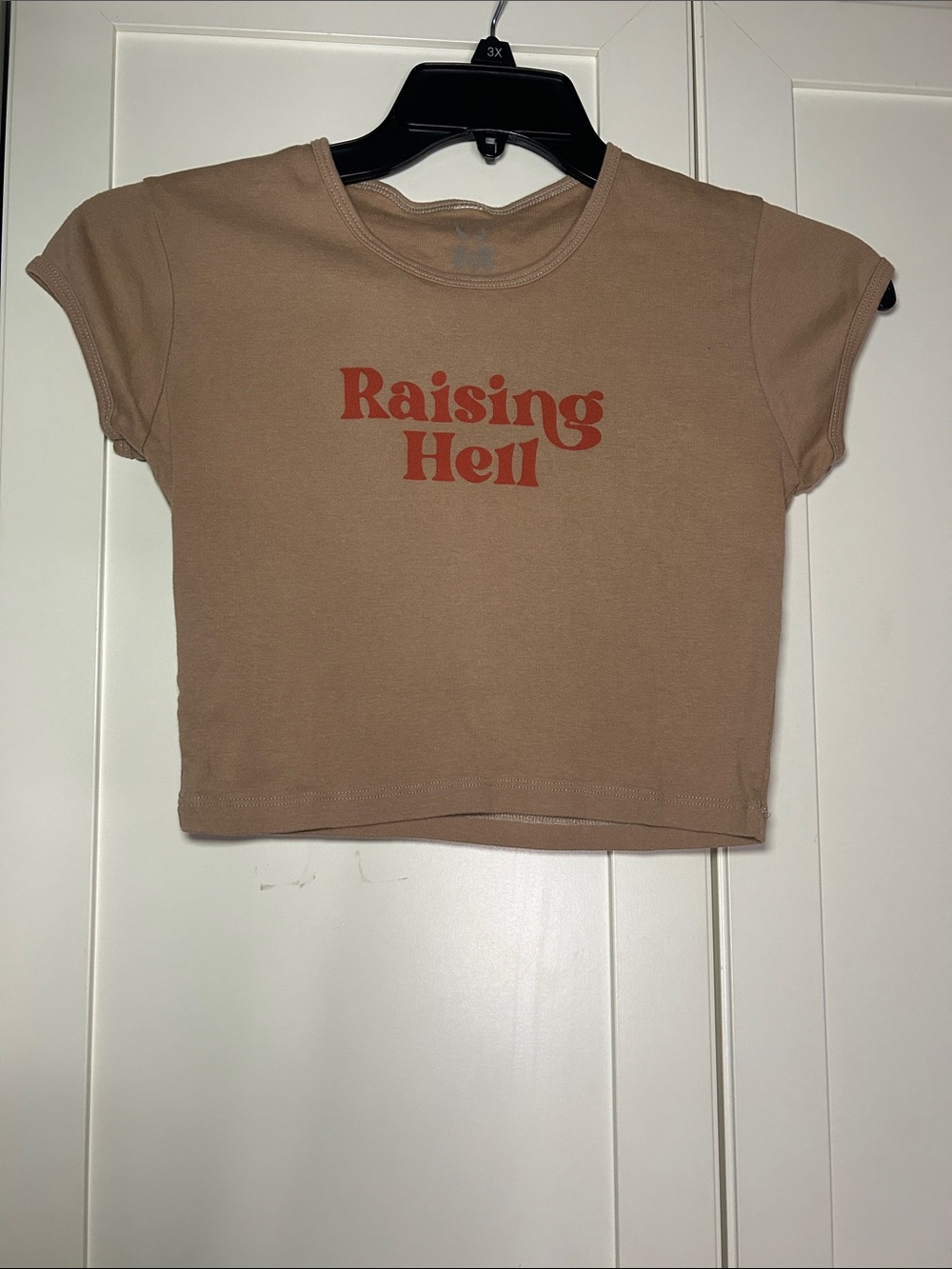 Rebel Soul Collective Raising Hell Graphic Crop Baby Tee - Tan with Red Print